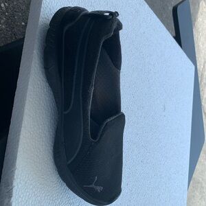 Black Puma slip on shoes